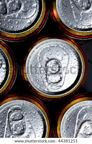 Shiny soda/beer cans viewed from above