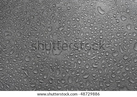 Texture metallic with drops water. Creative dark abstract