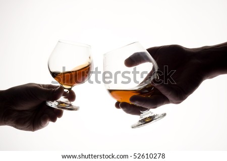 Whisky on the hand . Brown scotch
