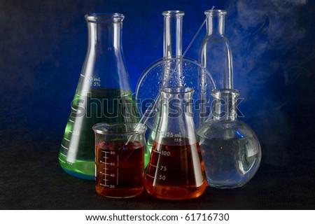 Chemistry flask on the dark background
