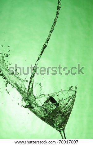 fresh drink. Splashing cocktail
