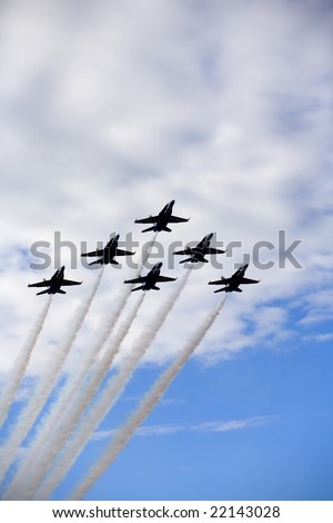 Six FA-18 jets of the U.S. Navy\'s precision flight team, the Blue Angels, fly in the skies of Hawaii.