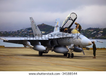 KANEOHE, HI - JULY 23: A flight of United States Marine Corps xFA-18 jet prepares for departure from the Marine Corps Air Station July 23, 2009 in Kaneohe, Hawaii.
