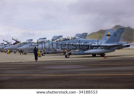 KANEOHE, HI - JULY 23: A flight of United States Marine Corps xFA-18 jets prepare for departure from the Marine Corps Air Station July 23, 2009 in Kaneohe, Hawaii.