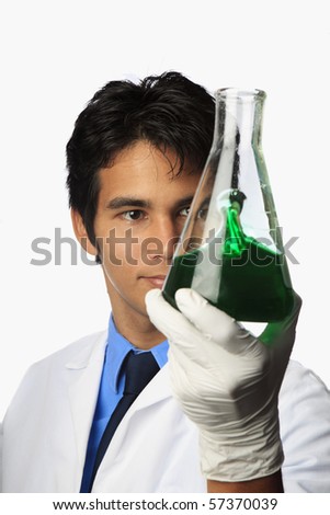 lab technician holding a flask with a fluid inside
