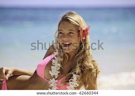 stock photo teenage girl in pink bikini at the beach in hawaii