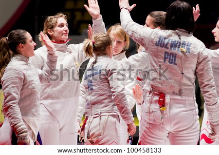 KIEV, UKRAINE - APRIL 13: Team tournament final match of the 2012 Women world fencing on April 13, 2012 in Kiev, Ukraine.