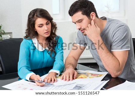 couple is considering the future design of the apartment