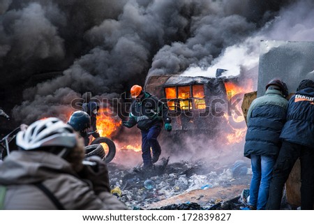 KYIV, UKRAINE - JAN 23: Angry crowd on the occupying street on the demostration during anti-government protest Euromaidan on January 23, 2014, in center of Kiev, Ukraine