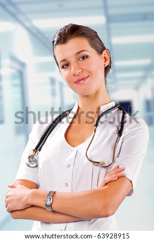 young  brunette doctor medical uniform with  stethoscope and file folder in an hospital