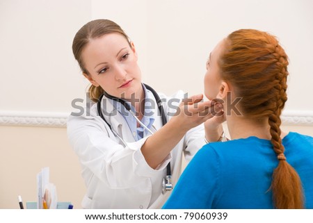 doctor endocrinologist testing woman patient at office