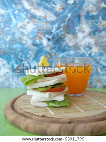Vegetarian sandwiches and fruit juice