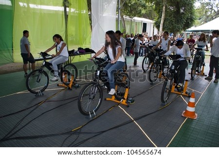 RIO DE JANEIRO - JUNE 04: unknown group of people pedaling in the tent Goal of Bicycle in the Event Green Nation Fest. Event Green Nation Fest,June 04, 2012 in Rio de Janeiro, Brazil