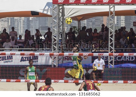 RIO DE JANEIRO - MARCH 09: The team's player of Brazil B, Lacraia, executes an attack play. Event Mundial de Futevolei 4 X 4 2013,  March 09, 2013 in Rio de Janeiro, Brazil