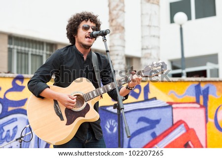 LAS PALMAS, SPAIN-APRIL 13: Singer and guitarist Said Muti, from Canary Islands, perform onstage during a charity for Sahara on April 13, 2012 in Las Palmas, Spain