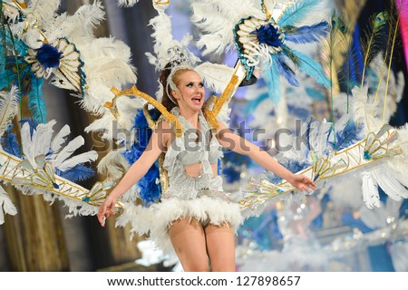 LAS PALMAS , SPAIN - FEBRUARY 8: Unidentified member from dance group Brisa De Volcan, from Canary Islands, during the Adult Comparsas Contest on February 8, 2013 in Las Palmas, Spain