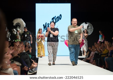 CANARY ISLANDS -27 SEPTEMBER: The designers from Ma + Tino on the catwalk during Carnival Fashion World in Las Palmas September 27, 2014 in Canary Islands, Spain