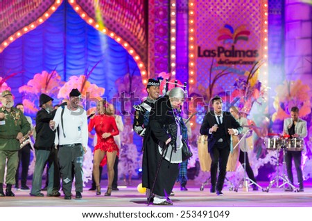 CANARY ISLAND, SPAIN - FEBRUARY 13, 2015: Armonia Show and unidentified people with costumes performing onstage during city of Las Palmas carnival One Thousand and One Nights Queens Gala show.