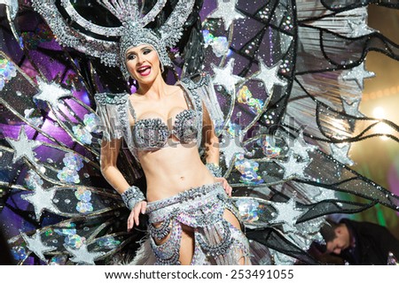 CANARY ISLAND, SPAIN - FEBRUARY 13, 2015: Alba Sanchez Diaz onstage with costume from designer Mari Patron during city of Las Palmas carnival One Thousand and One Nights Queens Gala show.