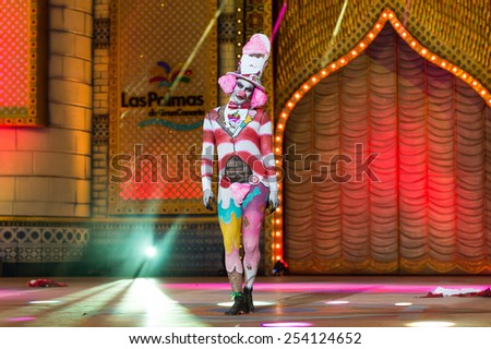 CANARY ISLAND, SPAIN - FEBRUARY 17, 2015: Eleazar Martin Guedes onstage during city of Las Palmas carnival One Thousand and One Nights Body Painting Contest.