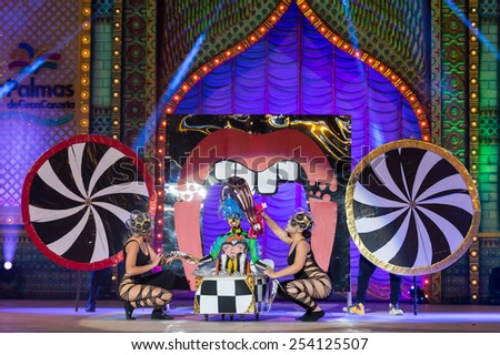 CANARY ISLAND, SPAIN - FEBRUARY 17, 2015: Idaira Bujeda Molina (m) and her assistants onstage during city of Las Palmas carnival One Thousand and One Nights Body Painting Contest.