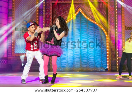 CANARY ISLAND, SPAIN - FEBRUARY 15, 2015: Teenagers from the Spanish band Conectakids performing onstage during city of Las Palmas carnival One Thousand and One Nights Junior Queen Gala.