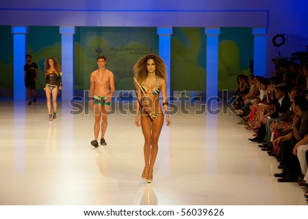 CANARY ISLANDS - JUNE 26: A model on the catwalk wearing a Rappido Bikinis design from the collection Bella Donna during Moda Calida in Maspalomas, June 26,2010 in Canary Islands, Spain