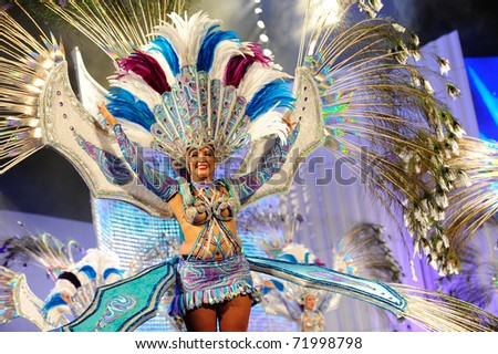 LAS PALMAS - FEBRUARY 20: Comparsa Araguime, winning dance group, from Canary Islands, performs onstage during the carnival\' dance group competition for adults on February 20, 2011 in Las Palmas, Spain