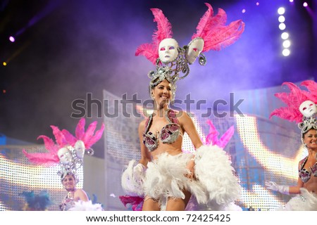LAS PALMAS - MARCH  1: Dance group Comparsa Metropolis  from Canary Islands performing onstage during the carnival\'s Great Dama Gala Contest March 1, 2011 in Las Palmas, Spain