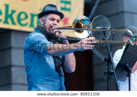 CANARY ISLANDS - JULY 8: Guzman Dominguez with trombone from Naya Band, from Canary Islands, performing onstage during Festival Canarias Jazz & mas July 8, 2011 in Las Palmas, Canary Islands, Spain