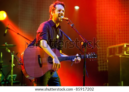 CANARY ISLANDS - SEPTEMBER 30: Guitarist and singer Victor Ordonez from the band The Good Company during Heineken Music Fest September 30, 2011 in Las Palmas, Canary Islands, Spain