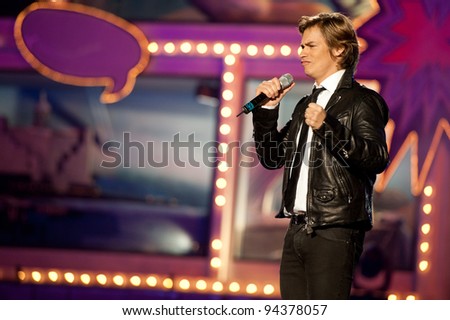 LAS PALMAS, SPAIN - FEBRUARY 3: Singer and television host Carlos Baute from Caracas in Venezuela performs onstage during the carnival Queens Gala on February 3, 2012 in Las Palmas, Spain.