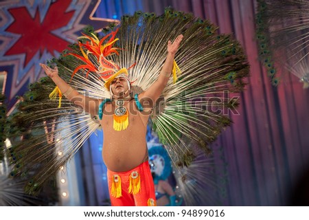 LAS PALMAS , SPAIN - FEBRUARY 10: Unidentified members from dance group Comparsa Los Lianceiros, from Canary Islands, during the Adult Dance Contest on February 10, 2012 in Las Palmas, Spain