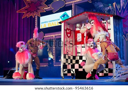 LAS PALMAS ,SPAIN - FEBRUARY 17: Juan Espinosa Armas(inside house), from Canary Islands, perform as Drag Pompi onstage during The Carnival\'s Drag Queen Gala on February 17, 2012 in Las Palmas, Spain