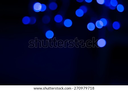 Beautiful defocused LED lights  filtered bokeh abstract with blue tone background.