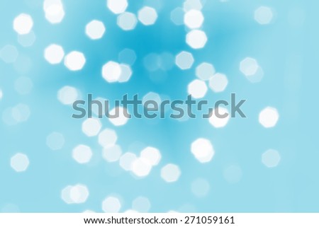 Beautiful defocused LED lights filtered bokeh abstract with blue tone background.