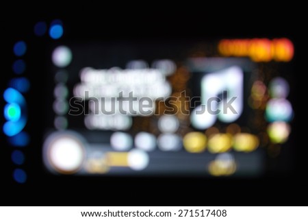 Beautiful defocused dvd player filtered bokeh abstract with yellow tone background.