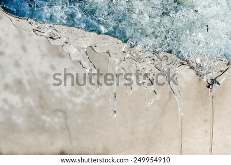 The water flow through the icicles