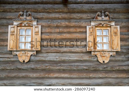 Wooden Windows with shutters in an Ancient wooden house