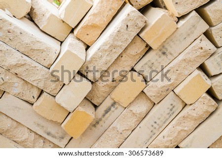 Facing bricks stacked in a warehouse building base
