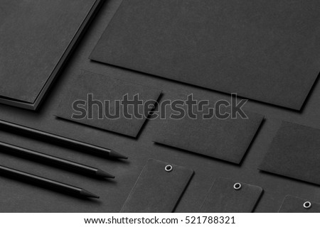 Brand identity mockup. Blank corporate stationery set at black textured paper background.