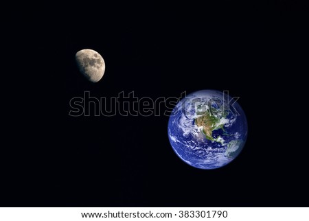 Photography of nightly sky with large moon and stars and earth on the background. Elements of earth on this image furnished by NASA.