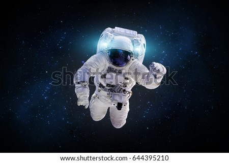 Astronaut in outer space in the deep galaxy. Science theme. Elements of this image furnished by NASA.