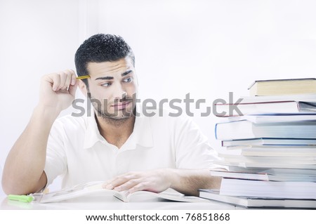 worried student looking books on white background, concept of concern