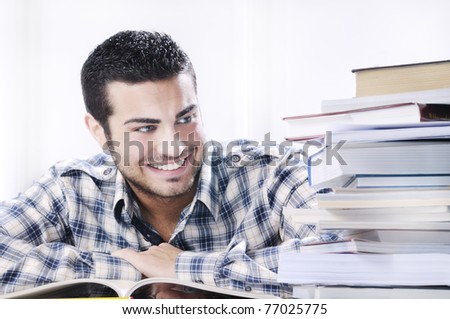 young student smiling with books on white background, concept of successful