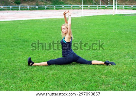 Beautiful sport woman doing stretching fitness. Yoga
