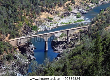 The historic No Hands Bridge spanning the American River in Auburn California. Built in 1912 and listed on the National Register of Historic Places.