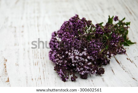 bunch of thyme herb on a old wooden background