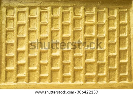 The Gold Color of the wall with the layer of the shadow at top corner