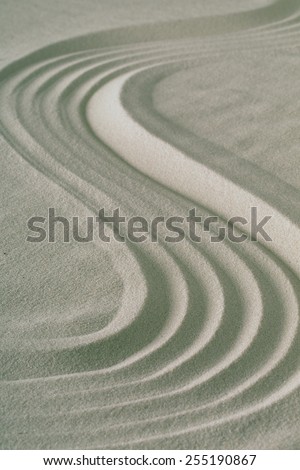 zen lines in sand background for spa wellness or yoga relaxation and meditation